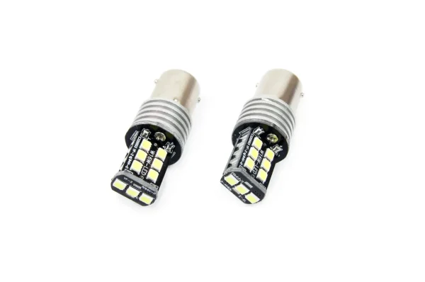 Set becuri auto cu LED CANBUS compatibil P21W BA15S 15 SMD 7.5W Alb 12/24V, destinat competitiilor auto sau off-road