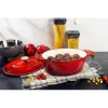 Oala de fonta emailata cu capac, ovala, maner din inox, lingura de lemn, rosie, 4.4 L, Magic Home